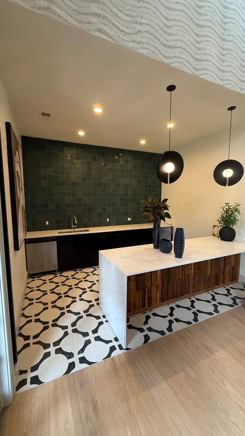 Commercial tile installation in a Chapel Hill apartment clubhouse with teal feature wall and patterned floor